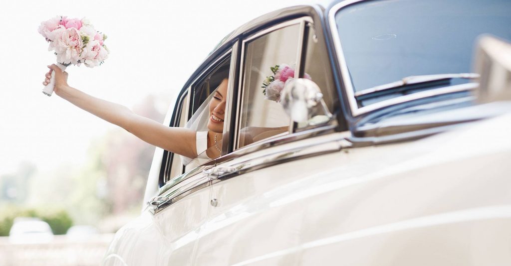 a bride into a car